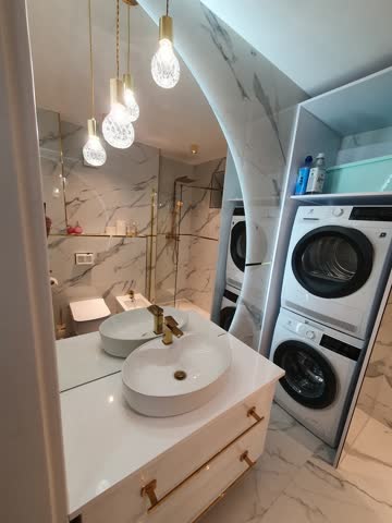 Łazienka, umywalka, oświetlenie, pralka, suszarka